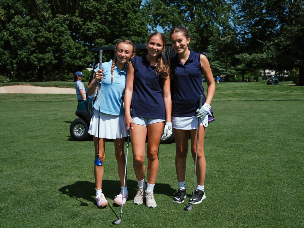 group of young female golfers